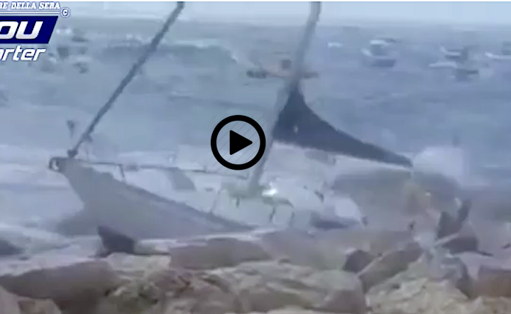 sailboat crashes into rocks in naples